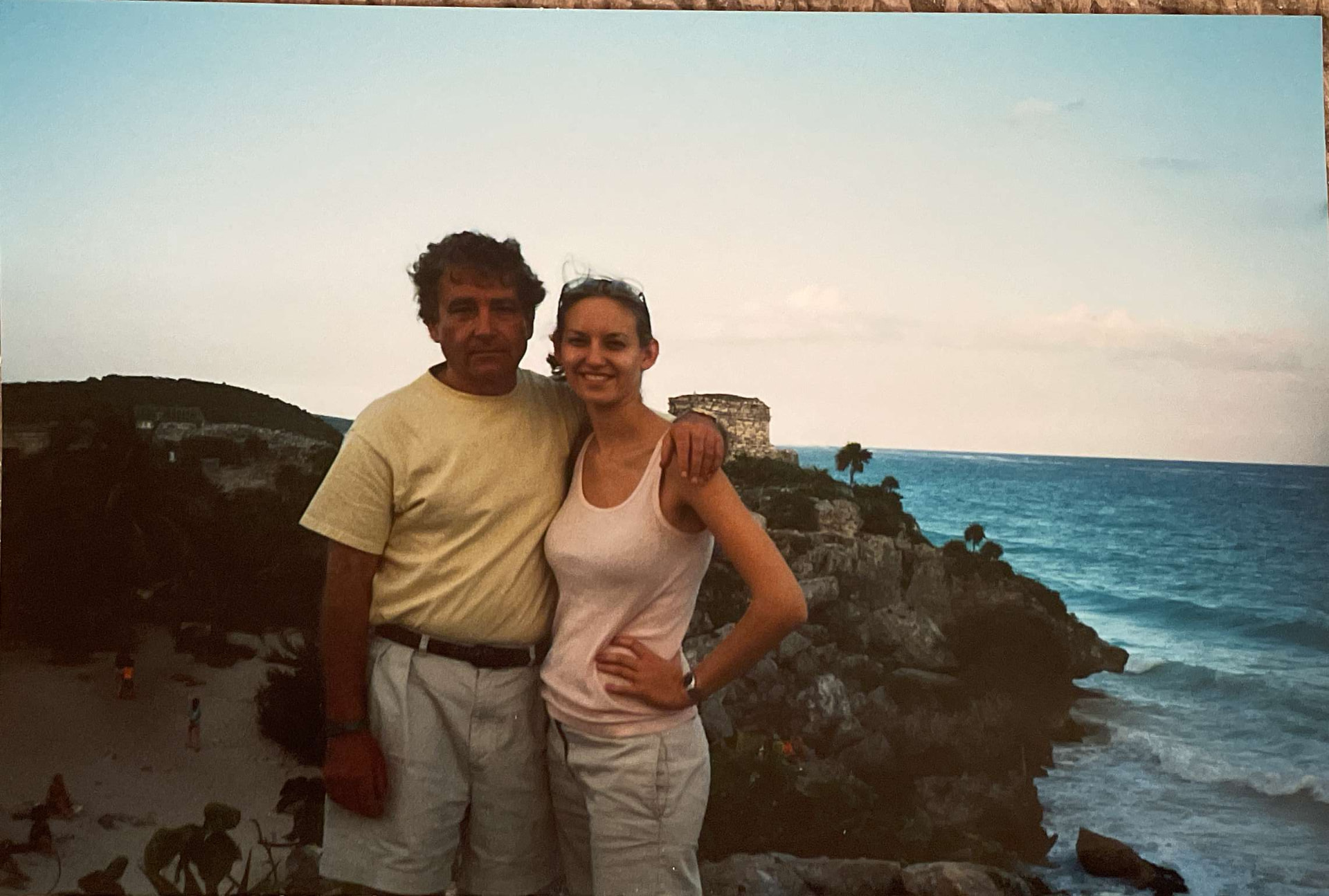 Lisa Kalfus with her father on a coastal cliff during one of their trips