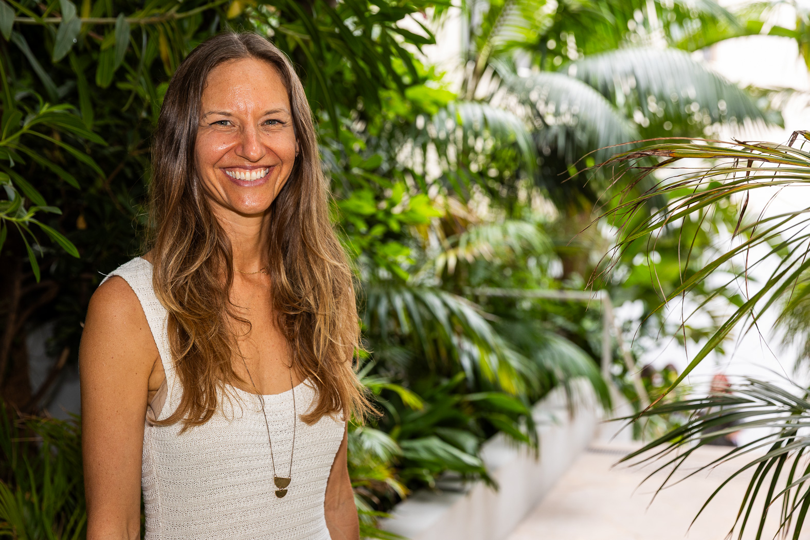 Lisa Kalfus smiling warmly in a close portrait