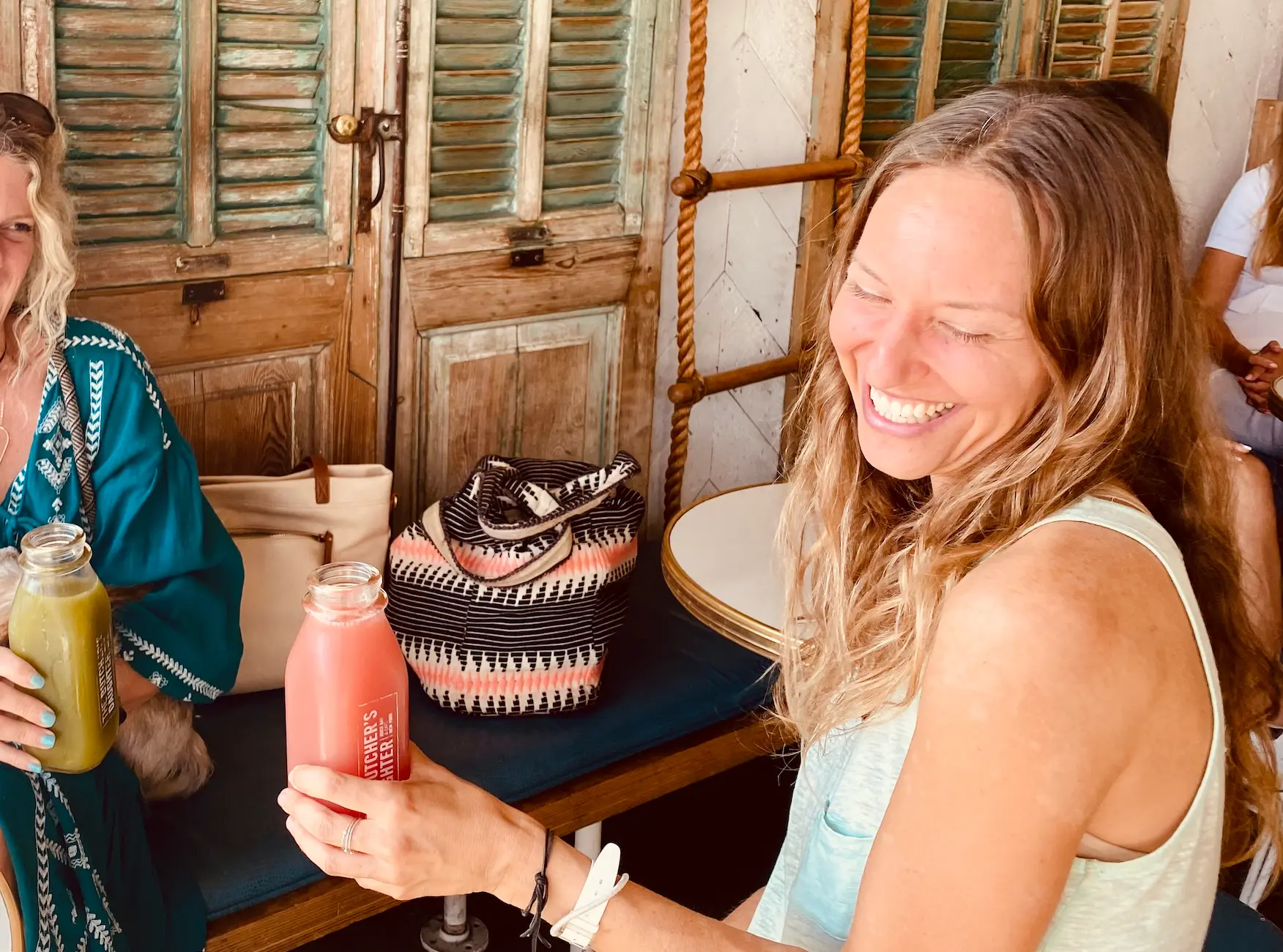 Lisa Kalfus in conversation at a table during the Acts of Connection journey
